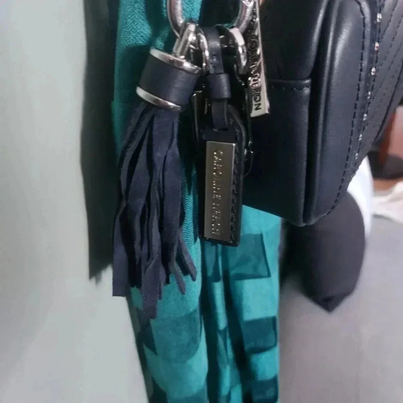 Caroline Neron | Opera Navy Crossbody Leather Mini Camera Bag with Tassel - Picture 14 of 15